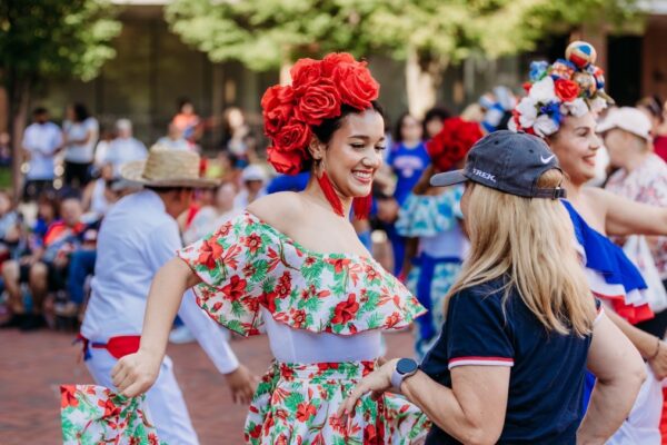 woman in colorful outfit dancing
