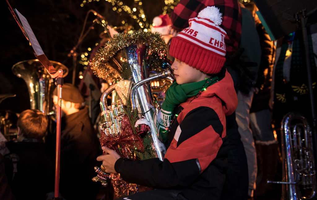 kid tuba player participating in Tuba Christmas performance